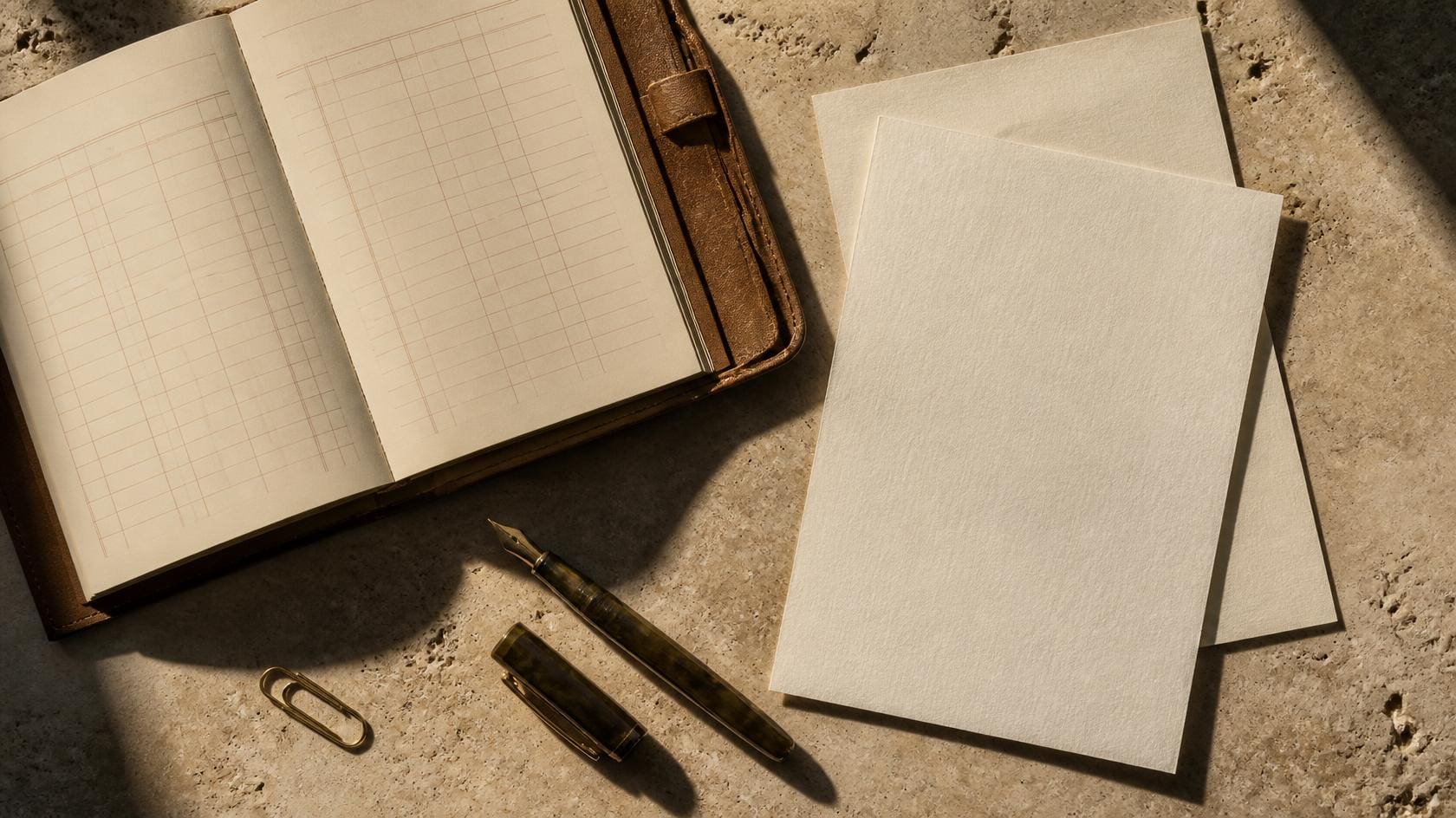 Financial documents laid out for an operational hiring decision
